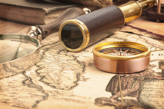 Brass telescope on map