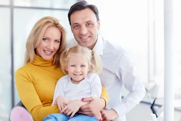 Family in dental clinic
