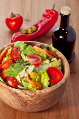 Wooden bowl with salad