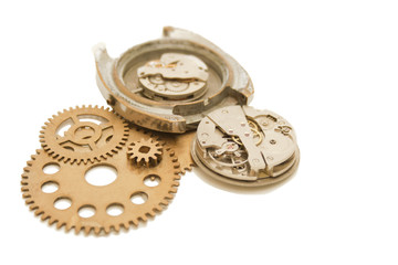 disassembled wrist watch and gears