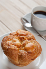 Muffin served with hot black coffee