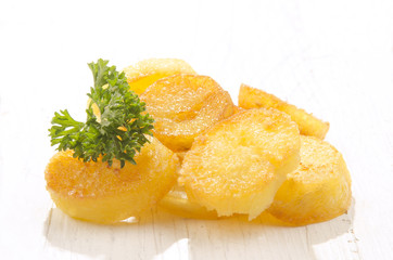 sliced potato with parsley