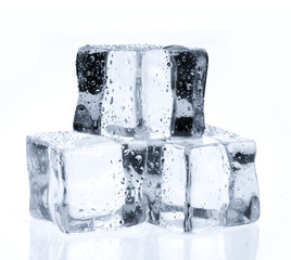 Ice cubes with water drops isolated on white background