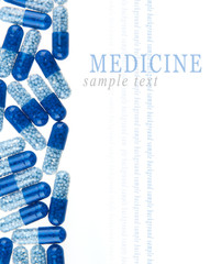 Blue pills isolated on white background