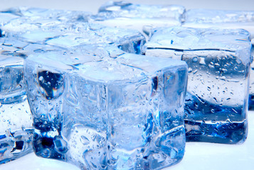 Naklejka na ściany i meble Abstract photo of ice cubes with blue lighting