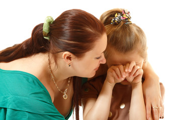 mother console her crying daughter