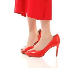 little fashion girl in mother's red dress and shoe's on high hee