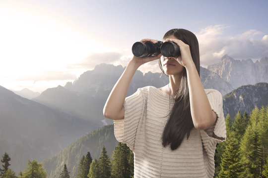 Young Woman Watching With Binocular