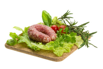 Salami with rosemary, salad and tomatoes