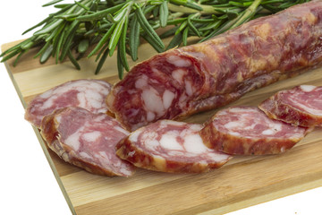 Salami with rosemary, basil and tomato
