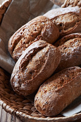 Wholemeal bread rolls in a basket