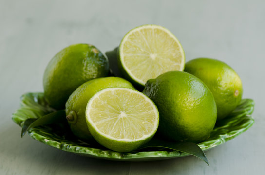 Limes in a ceramic plate.