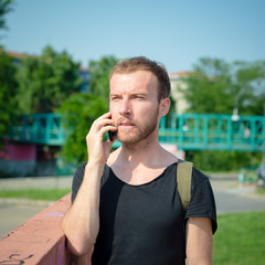 hipster modern stylish blonde man with phone