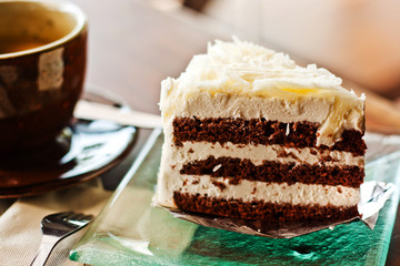 Chocolate cake with a cup of coffee