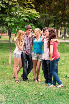 Group of happy smiling Teenage Students
