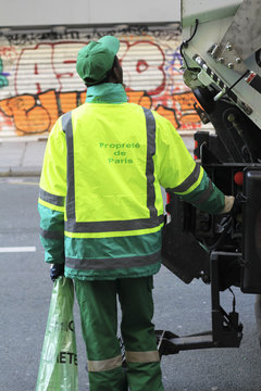 worker of the garbage track in Paris