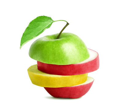 Green, red and yellow slices of apple