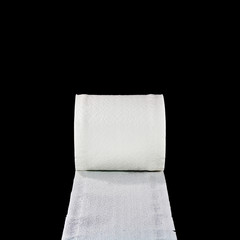 toilet paper isolated on black background