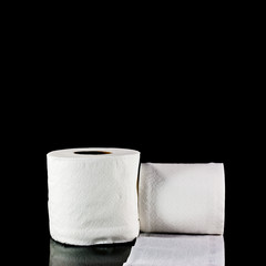 toilet paper isolated on black background