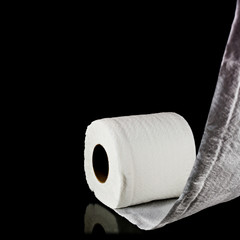 toilet paper isolated on black background
