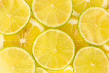 Fototapeta na wymiar Lime and lemon slices background