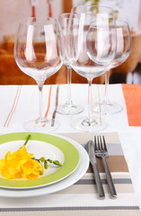 Table setting with glasses for different drinks