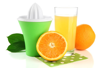 Citrus press, glass of juice and ripe oranges, isolated on