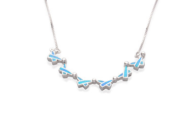silver necklace decorated by turquoise in islamic symbol shape