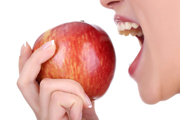woman with apple isolated on white