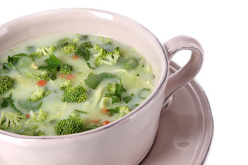 Cabbage soup in plate isolated on white
