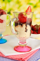 Delicious strawberry desserts in glass vase