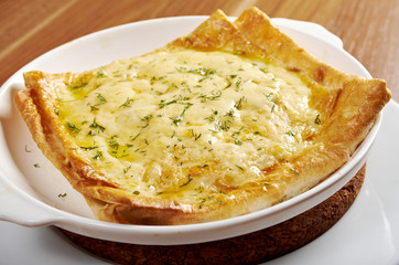 Qutab -baked  lavash cheese pie