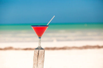 Strawberry margarita on the sandy white beach
