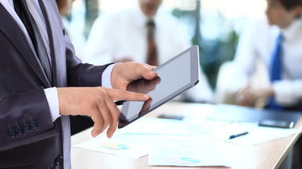 Businessman with the tablet.