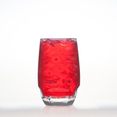 Red fruit flavor soft drinks whit soda water isolated