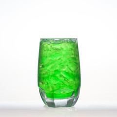Green fruit flavor soft drinks whit soda water isolated