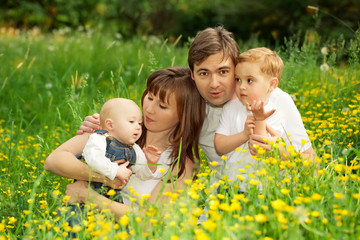 happy family relaxing in the park
