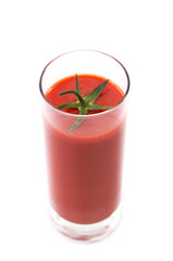 tail into tomato juice glass isolated