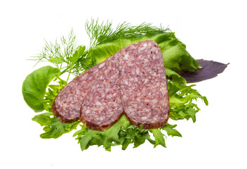 Sausages with salad and basil