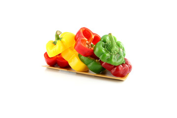 Slice the Three color of bell pepper in placing stacked.