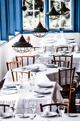 Modern restaurant interior with scenic city view