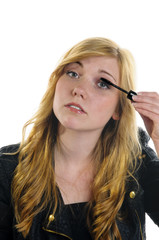 Girl applying Mascara