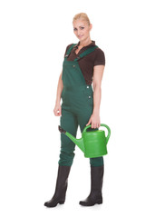 Portrait Of A Female Worker Holding Watering Can © Andrey Popov