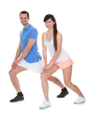 Fototapeta na wymiar Portrait Of Couple Exercising