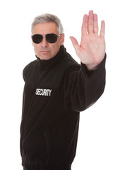 Naklejka premium Mature man gesturing stop sign