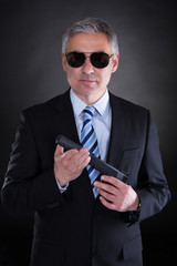Close-up Of Male With Handgun