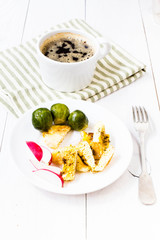 Fresh breakfast with fried eggs, brussels sprouts and radish on