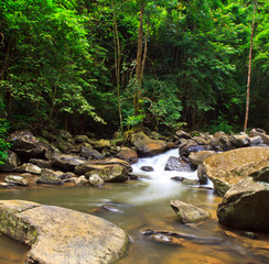 Naklejka na ściany i meble Waterfall in the forest of Thailand
