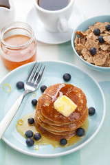 american pancakes with syrup and blueberry
