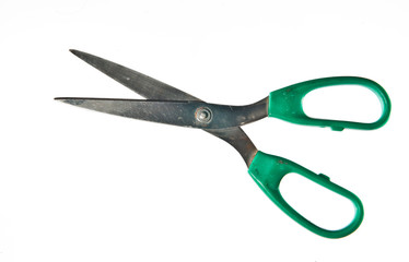 Old scissors on white background